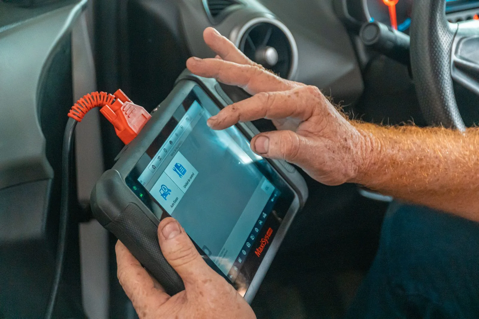 Vehicle engine diagnostic — illustrative workshop photograph